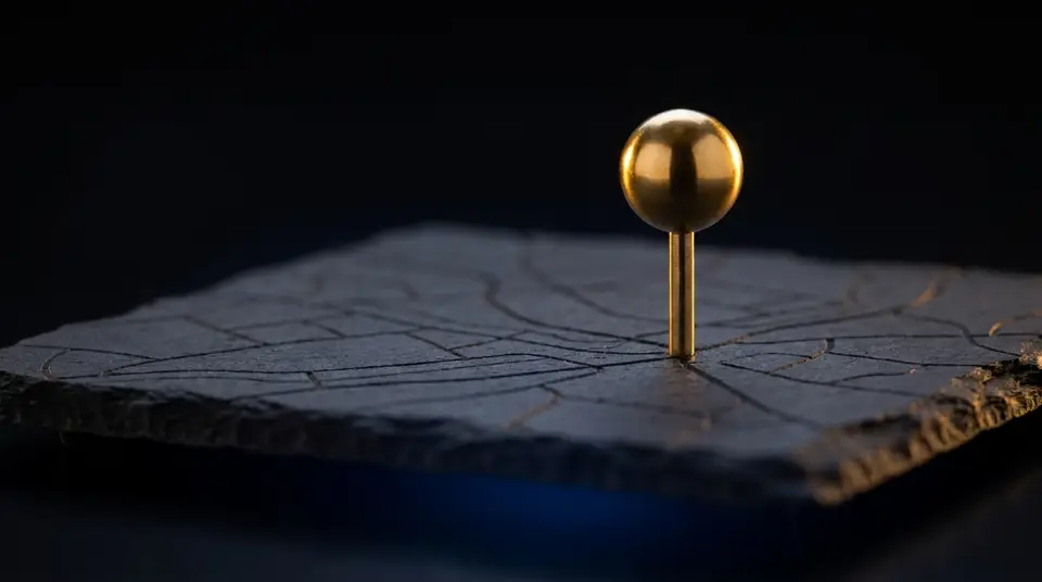 One gold pin in a stone map